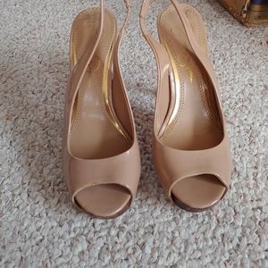 Nude slung back pumps
